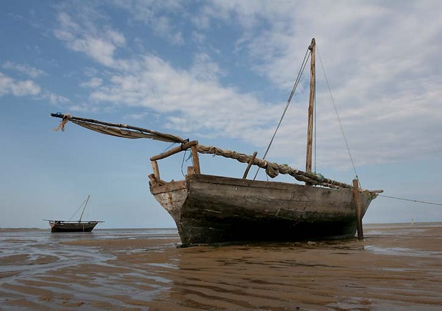 Fishing boats at low tide in the Indian Ocean