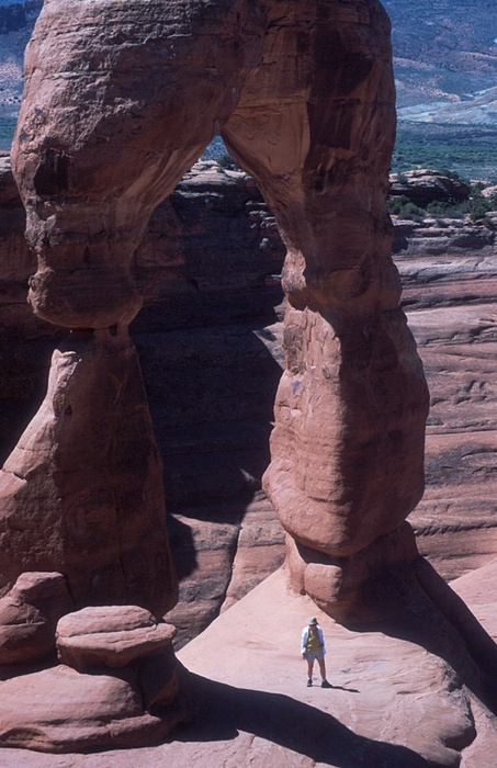 Hiker in Delicate arch